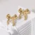 Golden Plated Zinc Alloy Ribbon Bow Earrings